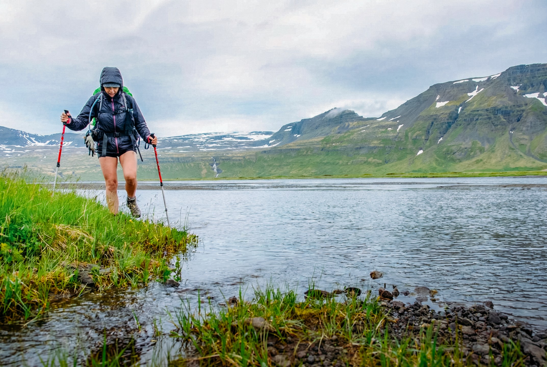 Hiker trekking through Hornstrandir Nature Reserve