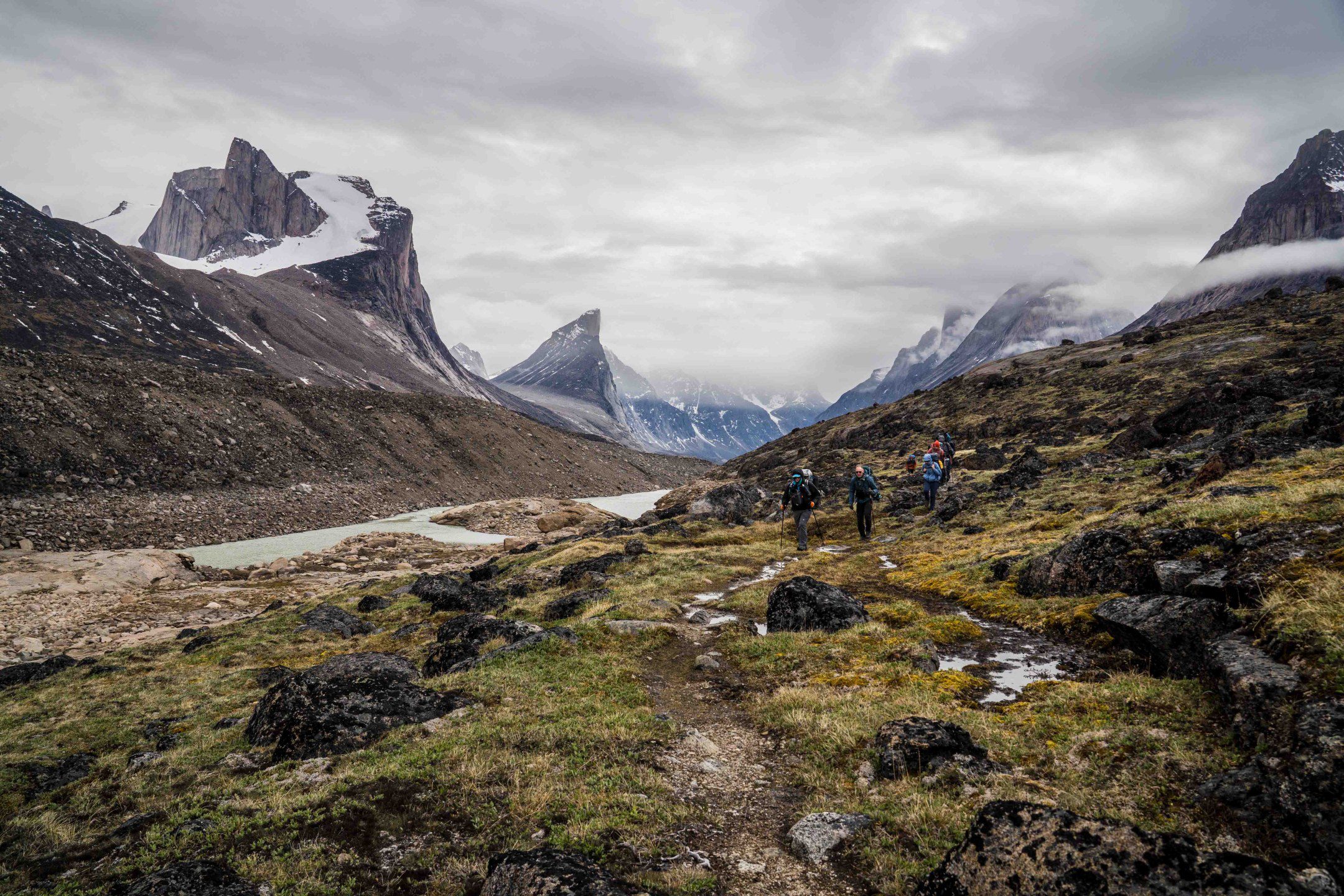 Group of hikers on the Akshayuk Pass Trail in Auyuittuq National Park, Baffin Island.