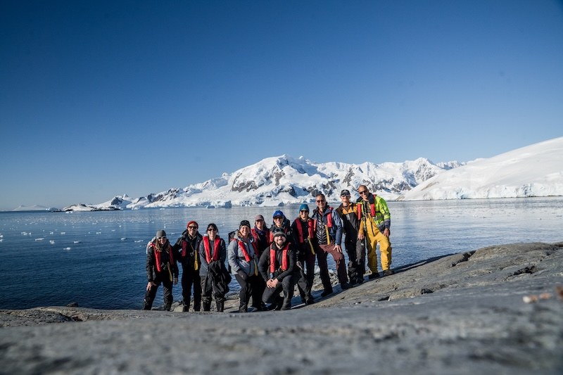 Expedition group’s first landing on Antarctica during a sunny day ashore