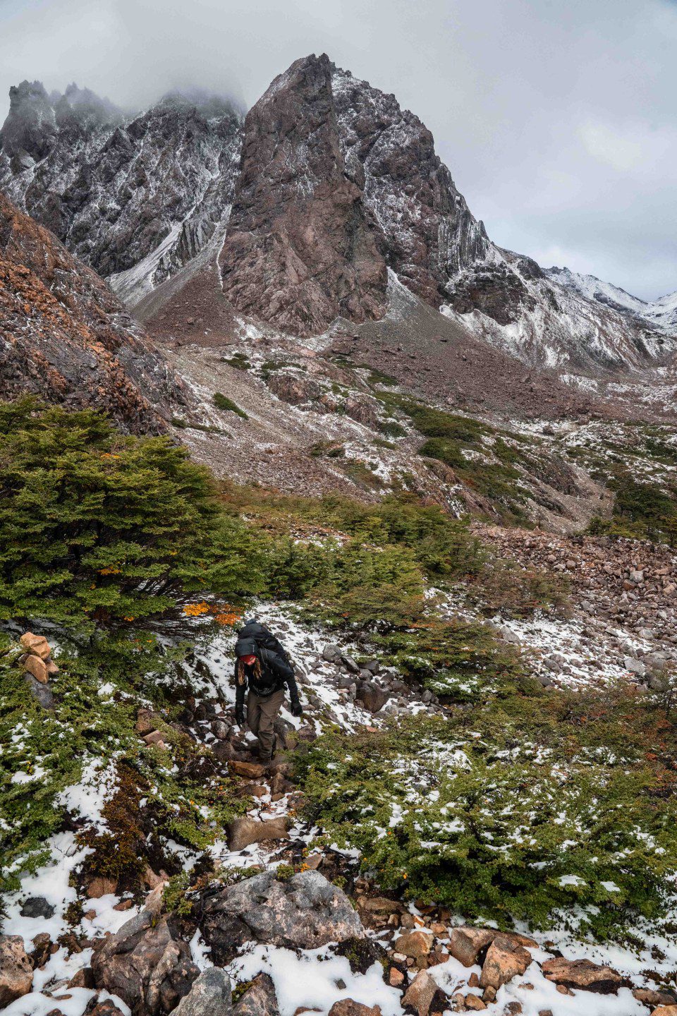 Dientes de navarino - Dramatic Chilean Patagonia mountains rising above the fjords, their rugged peaks covered in mist while hiking in Patagonia.