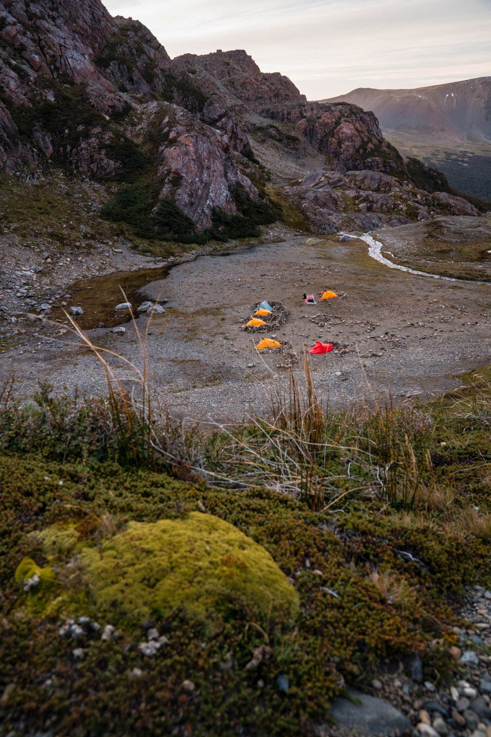 Dientes de navarino - Dramatic Chilean Patagonia mountains rising above the fjords, their rugged peaks covered in mist while hiking in Patagonia.