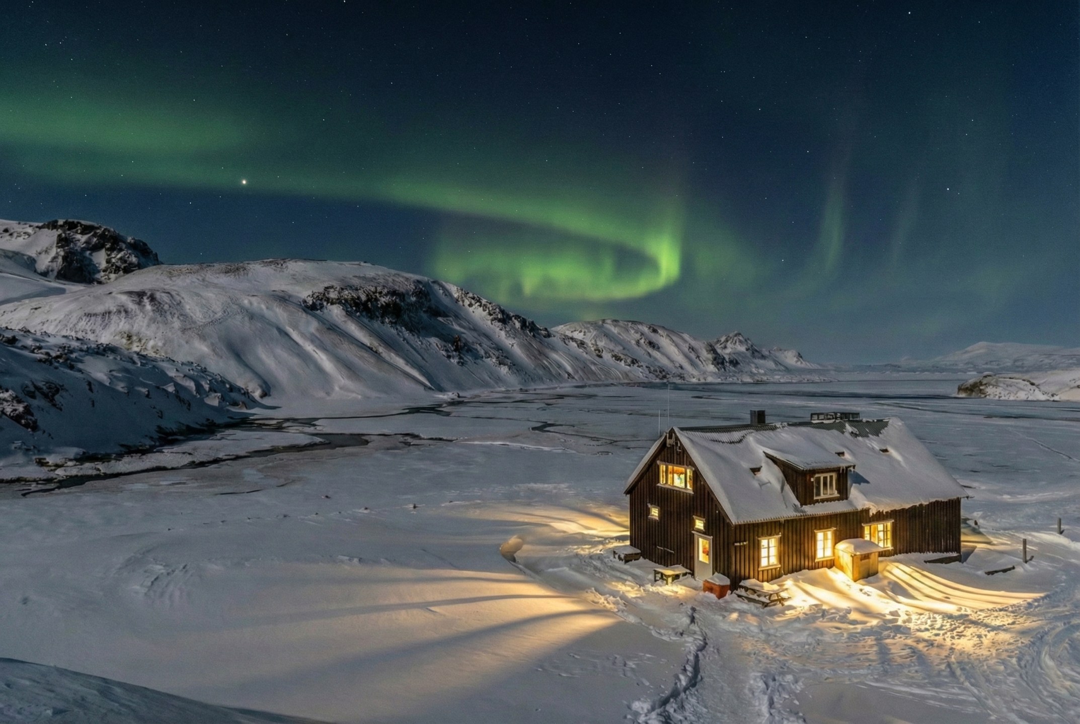 Travelers soaking in Landmannalaugar hot spring